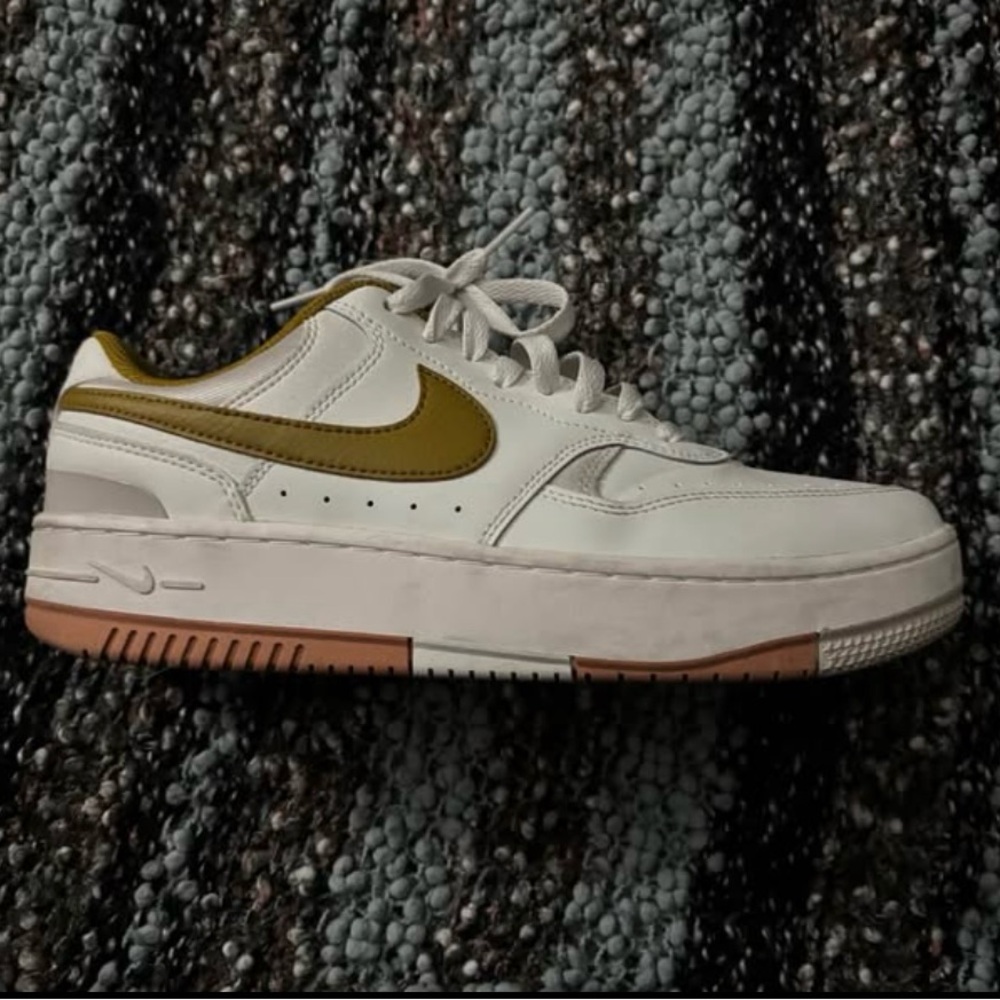 Nike White and Gold Sneakers Iconic Design